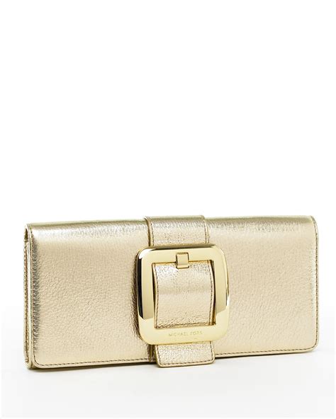 michael kors sutton clutch gold|Michael Kors gold evening bag.